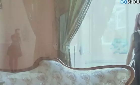 Tempting Brunette in Black Dress and Stockings